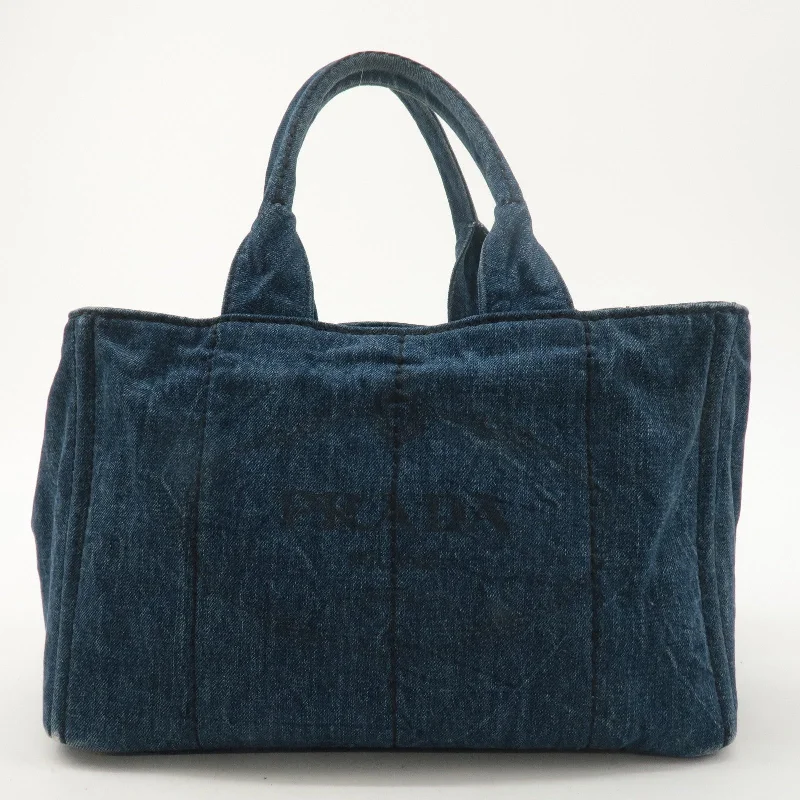 Prada handbags with a perforated leather detail for a unique and breathable designPRADA Logo Canvas Canapa Hand Bag Tote Bag Denim Blue