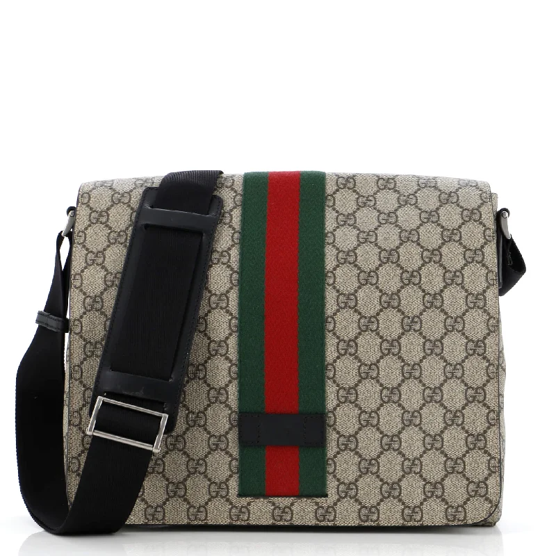 Women Gucci Sylvie bags featuring the signature web stripeWeb Flap Messenger Bag GG Coated Canvas Medium