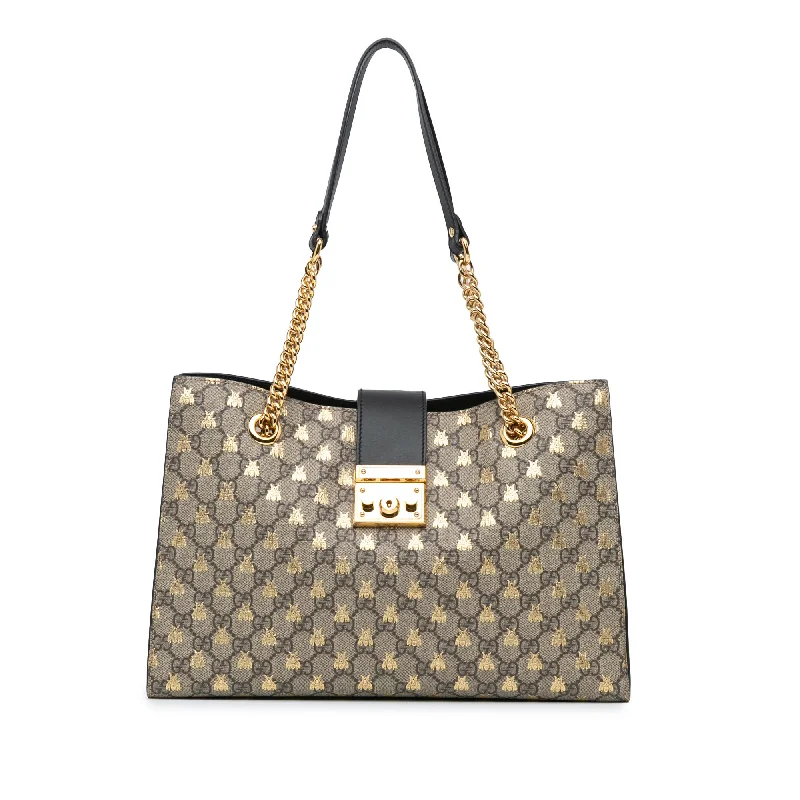 Gucci Marmont bags for women with a contrast - colored interiorBrown Gucci Medium GG Supreme Bees Padlock Tote