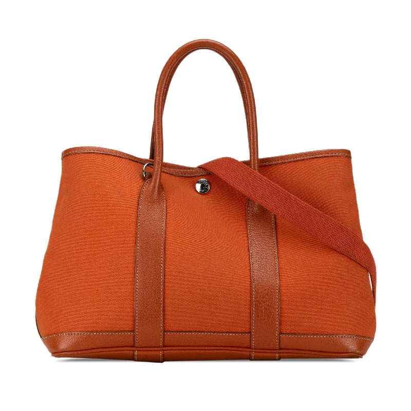 Customizable Hermes Bags with Personalized LocksOrange Hermès Toile and Negonda Garden Party 30 Satchel