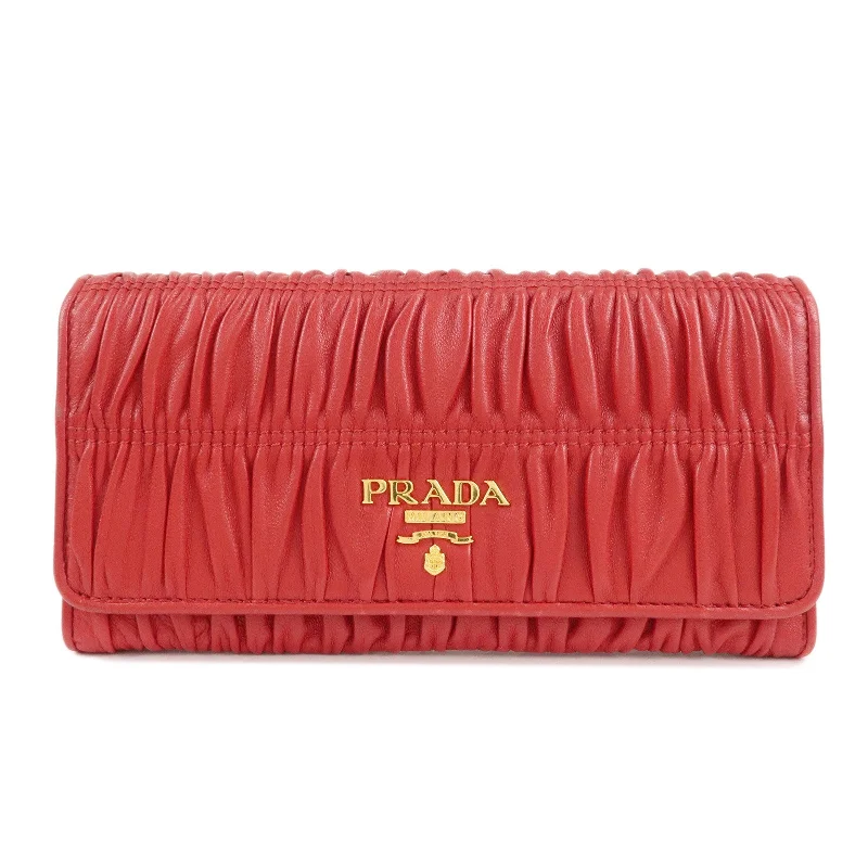 Prada Re - Edizione 2005 bags with a retro - inspired designPRADA Logo Leather Bi-Fold Long Wallet Red Gold Hardware