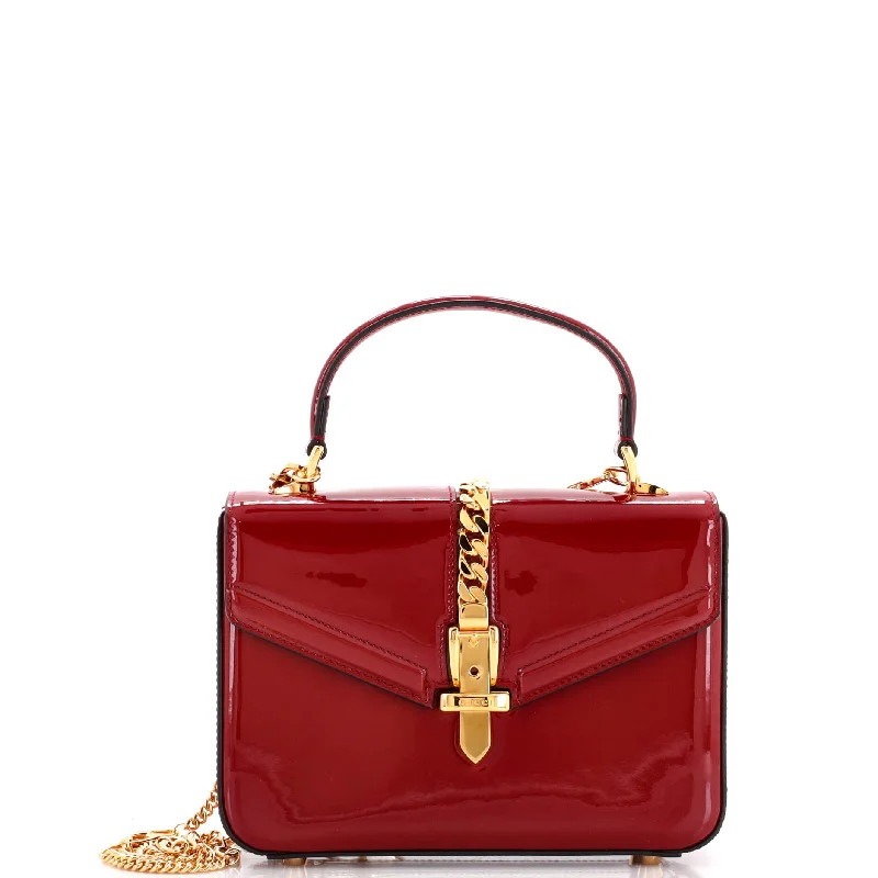 Gucci backpacks for women with a multi - pocket designSylvie 1969 Top Handle Bag Patent Mini