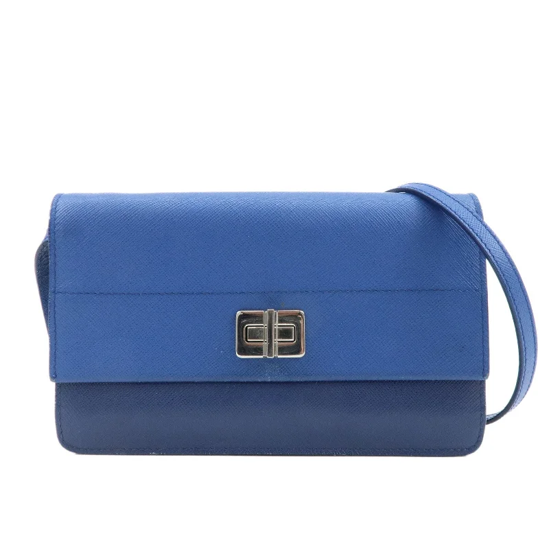 Ladies Prada Re - Edizione 2005 bags in a pastel color for a soft lookPRADA Leather Shoulder Bag Blue Navy