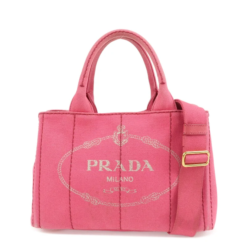 Prada crossbody bags with a printed floral pattern for a feminine touchPRADA Logo Canapa Mini Canvas 2Way Bag Pink 1BG439