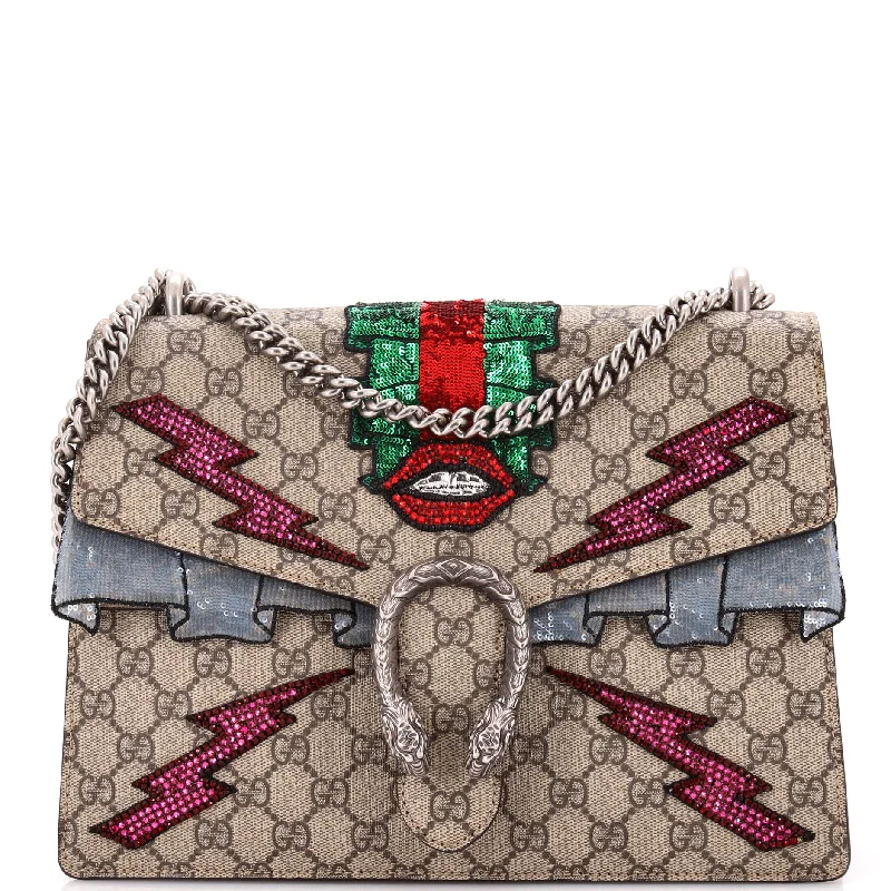 Women Gucci crossbody bags in a bold red colorDionysus Bag Embellished GG Coated Canvas Medium