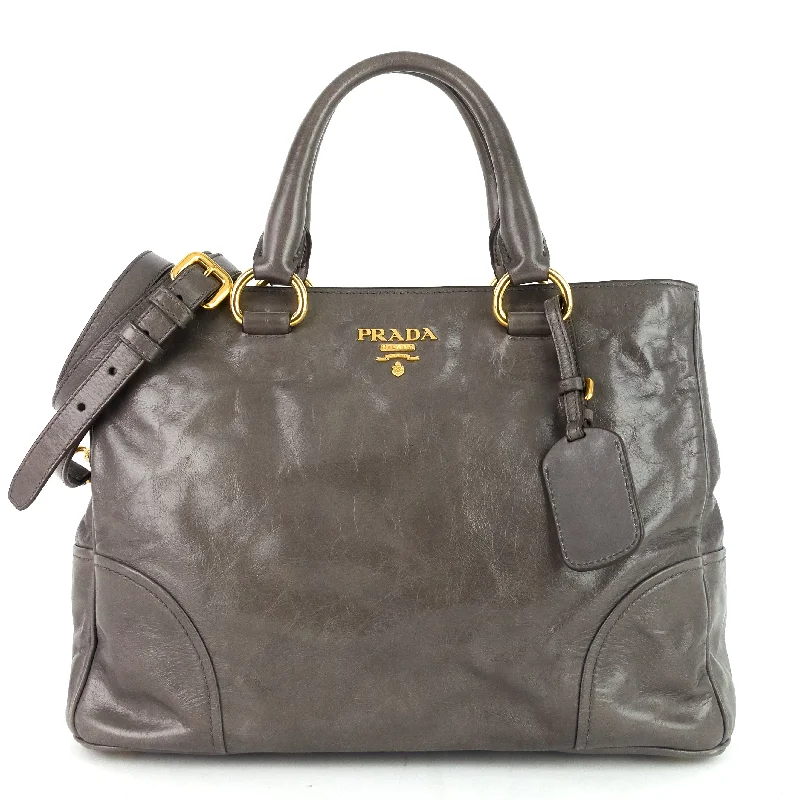 Prada Cleo bags with a curved shape and a chain - link shoulder strapVitello Shine Satchel Bag