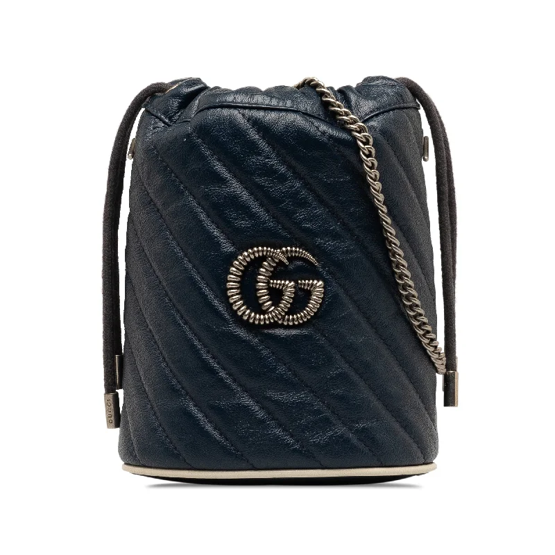 Women Gucci Sylvie bags with a crystal - embellished web stripeBlue Gucci Mini Torchon GG Marmont Bucket Bag