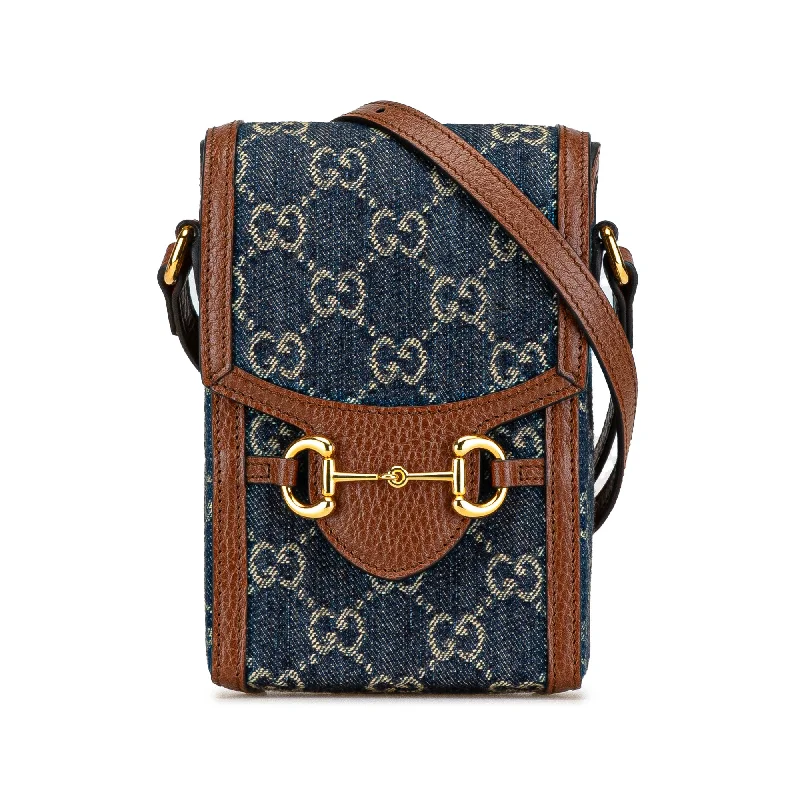 Women Gucci bags with a zippered interior pocketBlue Gucci Mini GG Denim Horsebit 1955 Crossbody