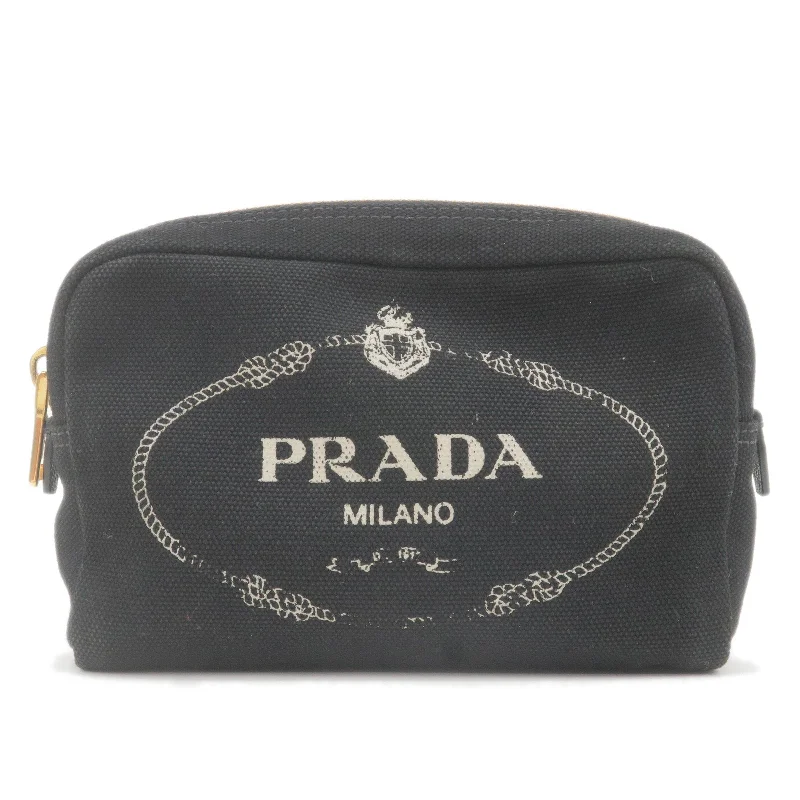 Ladies Prada handbags with a detachable wallet inside for added conveniencePRADA Logo Canvas Leather Canapa Mini Pouch Black 1NA021