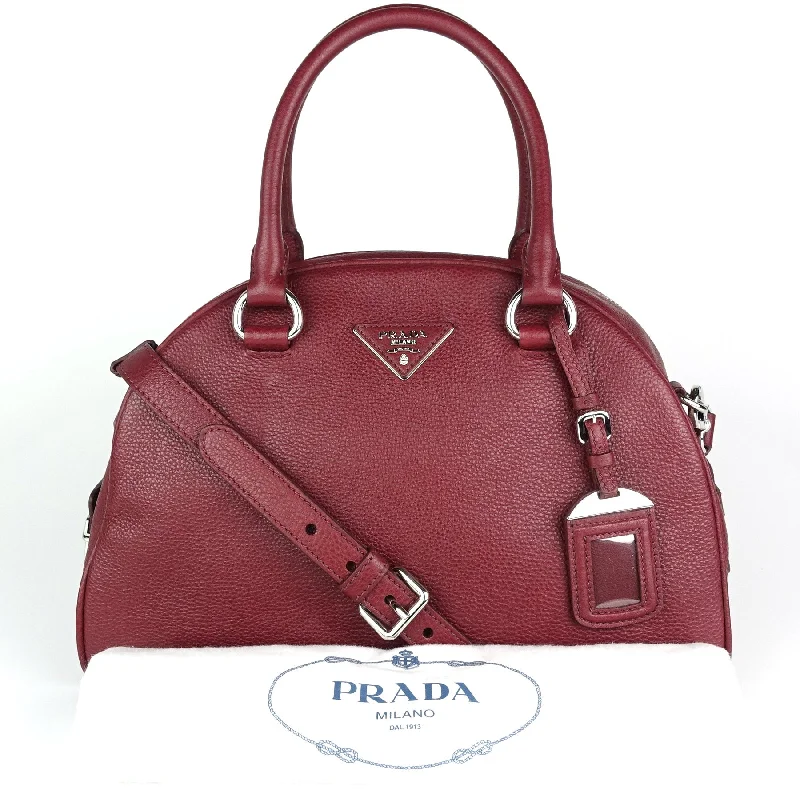 Prada Cahier bags with a leather - wrapped handle for a luxurious feelDome Vitello Daino Leather Handbag