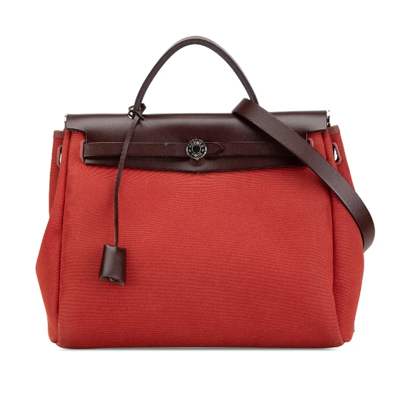 Faux Fur - Trimmed Hermes Bags for Winter SophisticationRed Hermès Toile Herbag Zip 31 Satchel