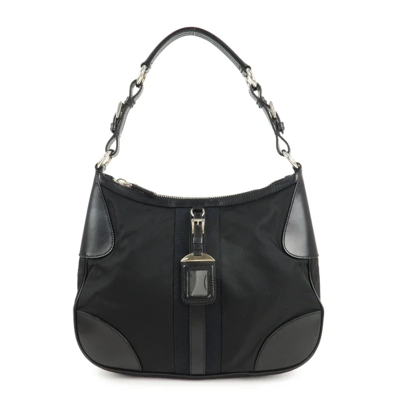 Prada Cleo bags with a snakeskin - effect panel for a bold and trendy lookPRADA Nylon Leather Shoulder Bag Black BR2604