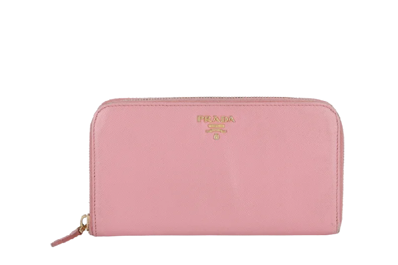 Prada bags with a snap - button closure and a decorative charm for a fashionable lookPRADA ZIP AROUND LONG WALLET PINK SAFFIANO LEATHER GOLD HARDWARE WITH BOX