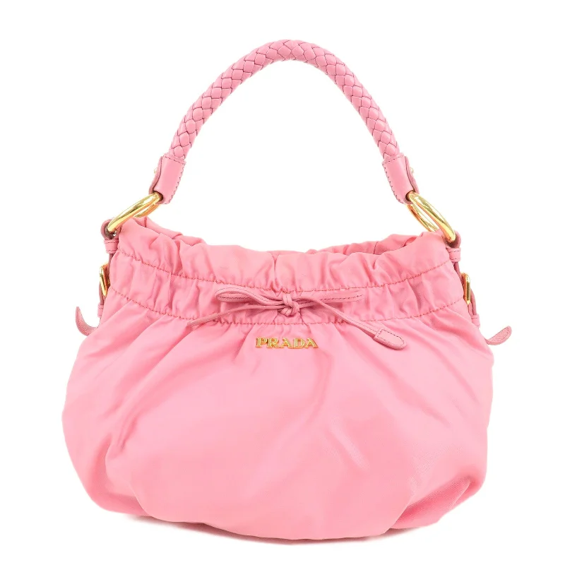 Prada crossbody bags with a woven leather strap for a unique texturePRADA Nylon Leather Gather Shoulder Bag Hand Bag Pink BR4237