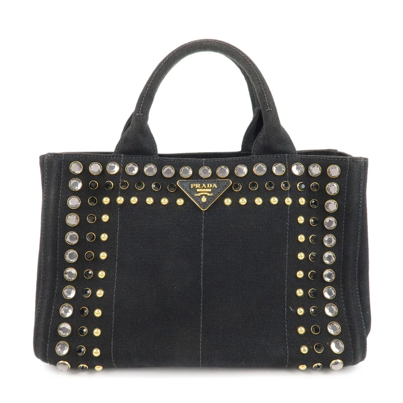 Prada handbags with a perforated leather detail for a unique and breathable designPRADA Canapa Mini Canvas Bijoux 2Way Bag Tote Bag Black 1BG439