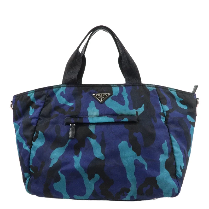 Prada tote bags with a spacious interior and a magnetic - snap closurePRADA Logo Nylon Leather Tote Bag Hand Bag Blue Black