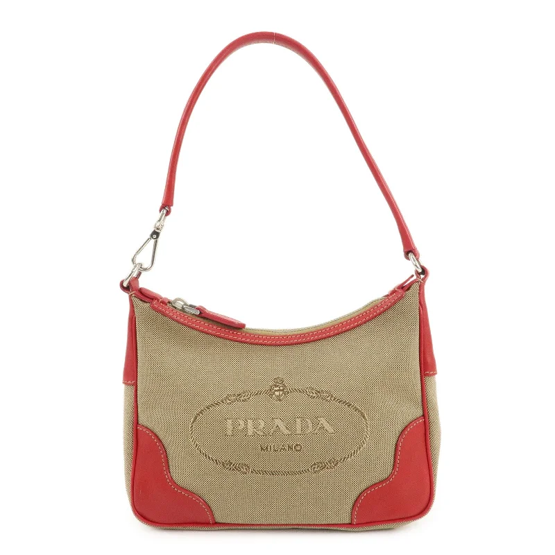 Prada handbags with a perforated leather detail for a unique and breathable designPRADA Logo Jacquard Leather Shoulder Bag Beige Red