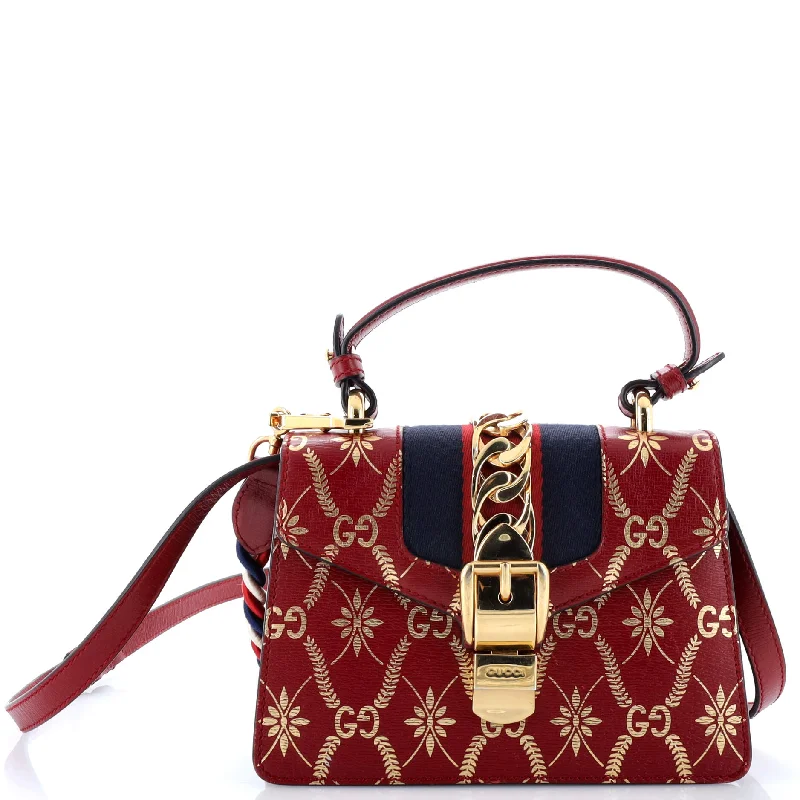 Women Gucci bags with a zippered interior pocketSylvie Top Handle Bag Printed Leather Mini