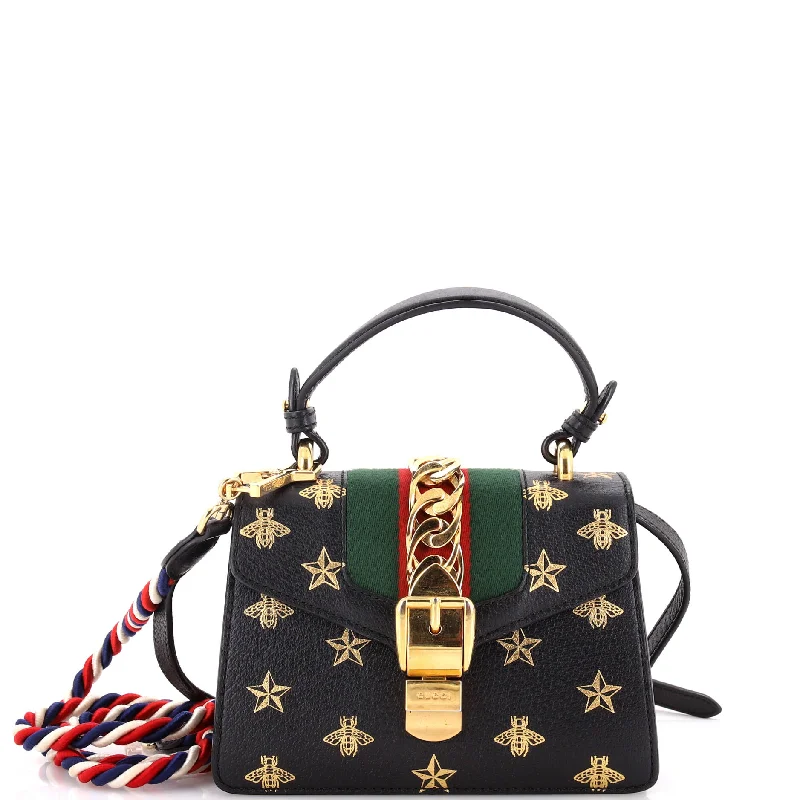 Ladies Gucci shoulder bags with a wide - width strapSylvie Top Handle Bag Printed Leather Mini