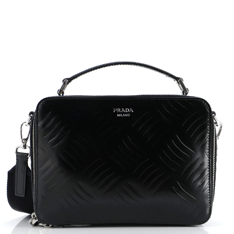 Prada tote bags with a printed Prada logo on the front for brand visibilityBrique Crossbody Bag Embossed Brushed Leather Medium