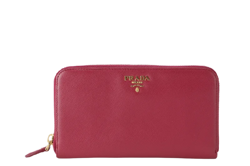 Prada Cahier bags featuring the signature triangular logo plaquePRADA IM0506 SAFFIANO ZIP WALLET IBISCO COLOR WITH CARD AND BOX