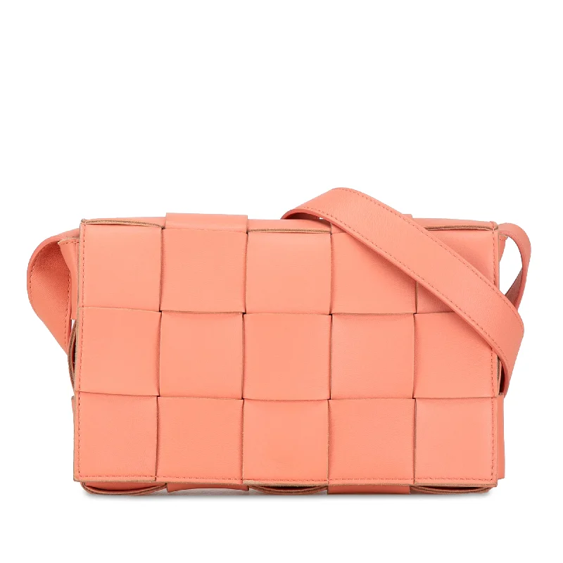 Bottega Veneta bags with suede finishesPink Bottega Veneta Calfskin Intrecciato Cassette Crossbody