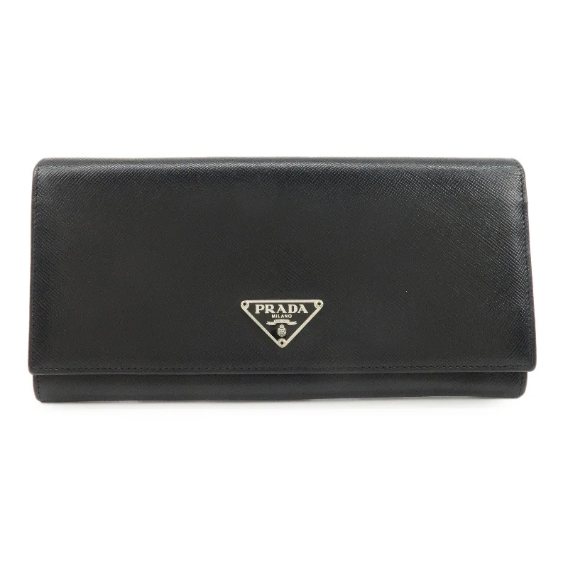 Ladies Prada handbags with a detachable wallet inside for added conveniencePRADA Leather Bi-fold Long Wallet Black Silver Hardware