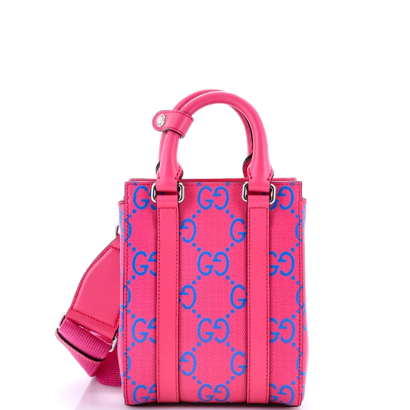 Ladies Gucci Dionysus bags with a chain - link shoulder strapConvertible Open Tote GG Embossed Perforated Leather Mini