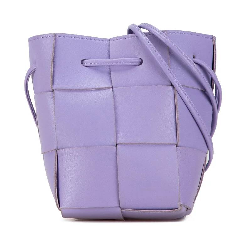 Bottega Veneta bags with ribbed texturesPurple Bottega Veneta Mini Nappa Intrecciato Cassette Bucket