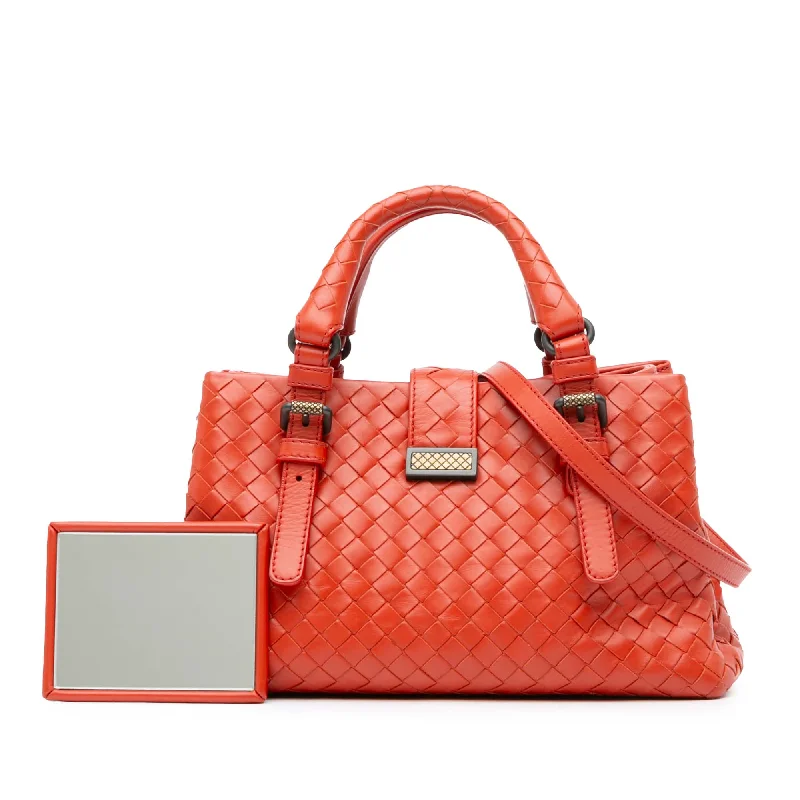 Bottega Veneta bags with engraved logosOrange Bottega Veneta Mini Nappa Intrecciato Roma Satchel