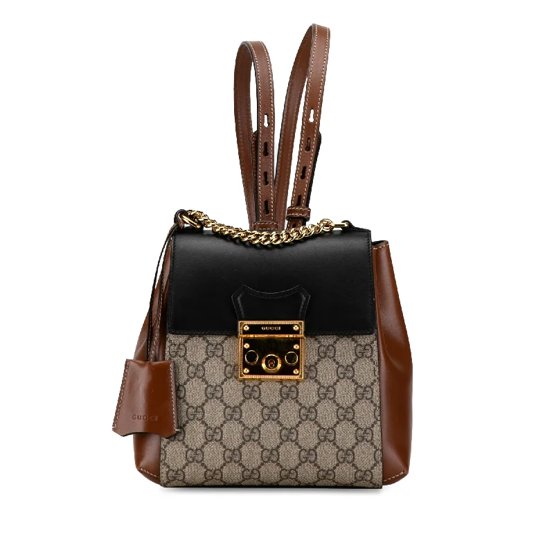 Gucci Marmont bags for women with a contrast - colored interiorBrown Gucci GG Supreme Padlock Backpack