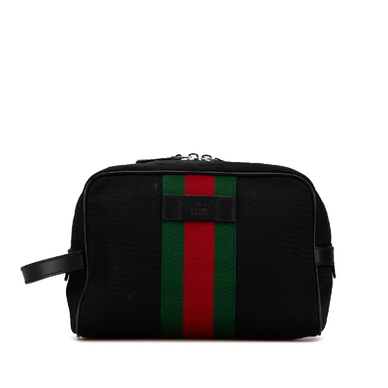 Women Gucci bags with a snap - button closure and a decorative charmBlack Gucci Techno Web Canvas Clutch