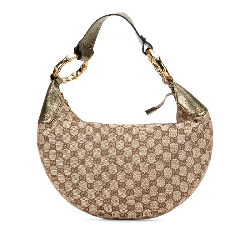 Women Gucci bags with interlocking G hardware for a classic lookBrown Gucci Medium GG Canvas Bamboo Ring Hobo