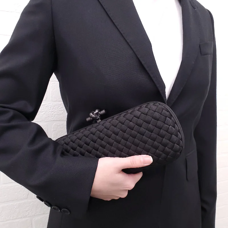 Bottega Veneta bags for stargazing nightsBOTTEGA VENETA SATIN INTRECCIATO BLACK LONG KNOT CLUTCH