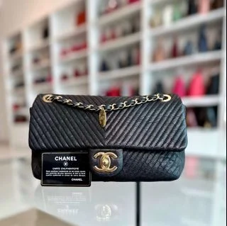 Chanel bags with iconic gold chainsChevron Surpique CC Herringbone Medallion Flap Goatskin Black GHW No 21