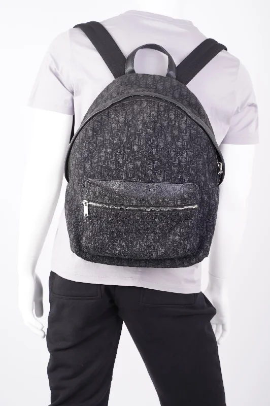 Christian Dior tote bags with a printed Dior logo on the frontChristian Dior Mens Rider Backpack Black Canvas / Leather