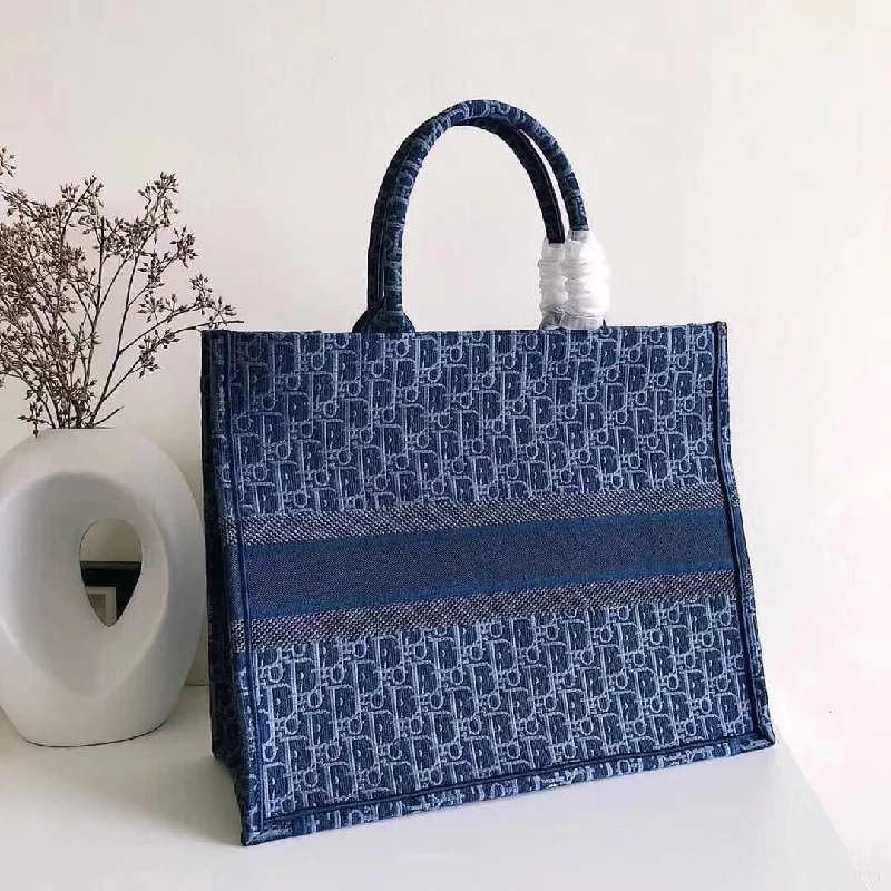 Stylish Christian Dior shoulder bags with a tassel - adorned zipperChristian Dior Book Tote In Denim Blue Christian Dior Oblique-embroidered Canvas