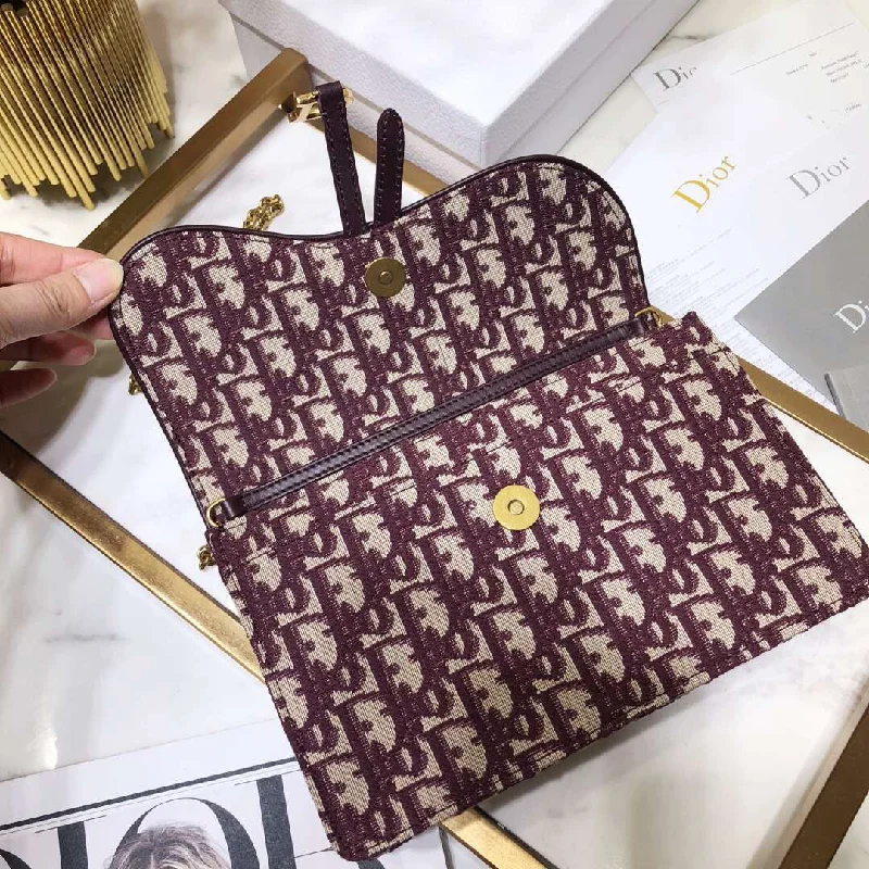 Christian Dior bags with a zip - top closure and multiple compartmentsChristian Dior Bordeaux Oblique Saddle Chain Clutch