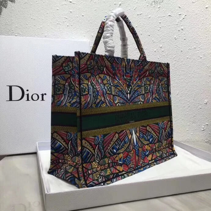 Christian Dior handbags with a snap - button closure and a decorative buckleChristian Christian Dior Butterfly Book Tote In Multicolor Embroidered Canvas