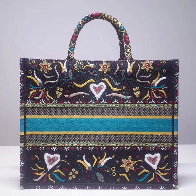 Christian Dior bags with a zip - top closure and multiple compartmentsDior Flowers And Hearts Book Tote In Multicolor Canvas