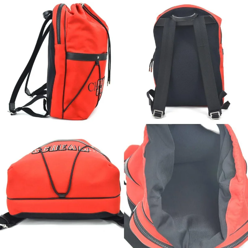 Christian Dior backpacks with a sleek, minimalist silhouetteDIOR HOMME rucksack scream collaboration canvas red men's