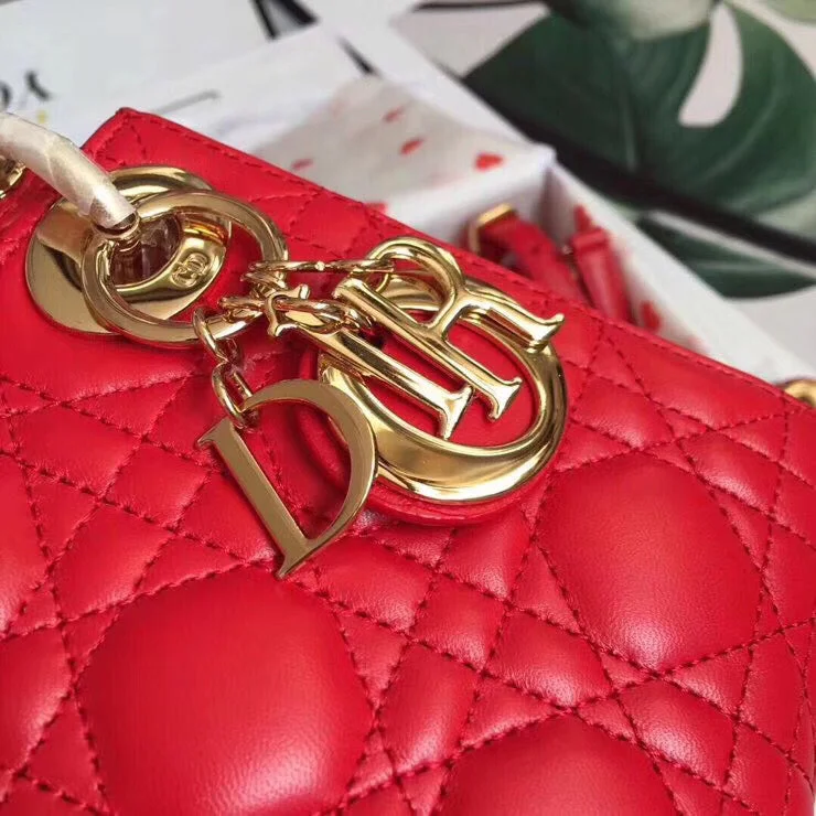 Christian Dior Saddle bags with a patent leather finish for a shiny lookDior Lady Dior Mini Chain Bag In Red Lambskin