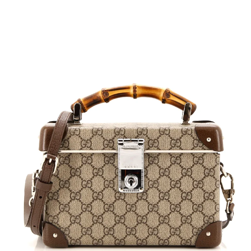 Women Gucci Sylvie bags with a crystal - embellished web stripeBamboo Globe-Trotter Vanity Case GG Coated Canvas