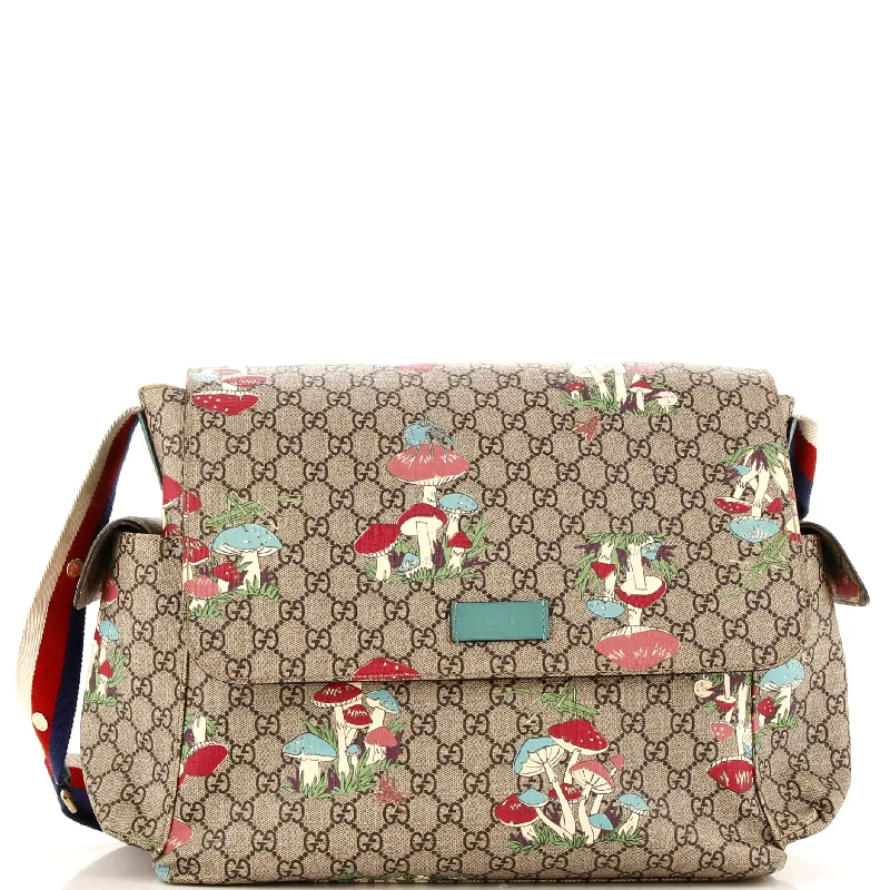 Ladies Gucci Dionysus bags with a star - shaped charmDiaper Bag Printed GG Coated Canvas