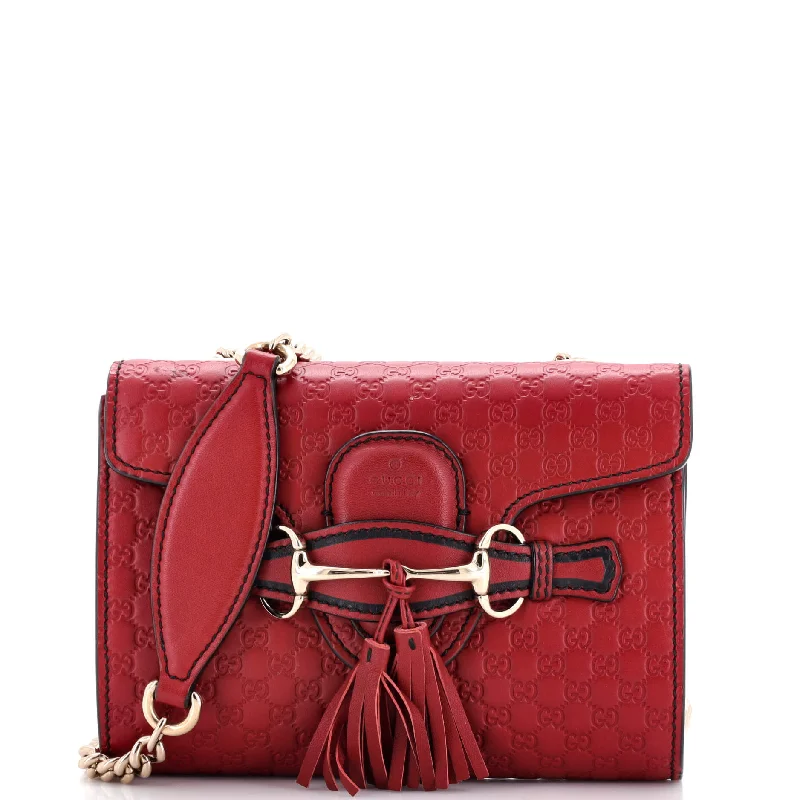 Women Gucci Sylvie bags with a monogram - embossed leatherEmily Chain Flap Bag Microguccissima Leather Mini