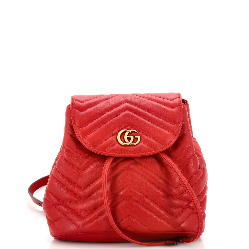 Ladies Gucci shoulder bags with a wide - width strapGG Marmont Drawstring Backpack Matelasse Leather Mini