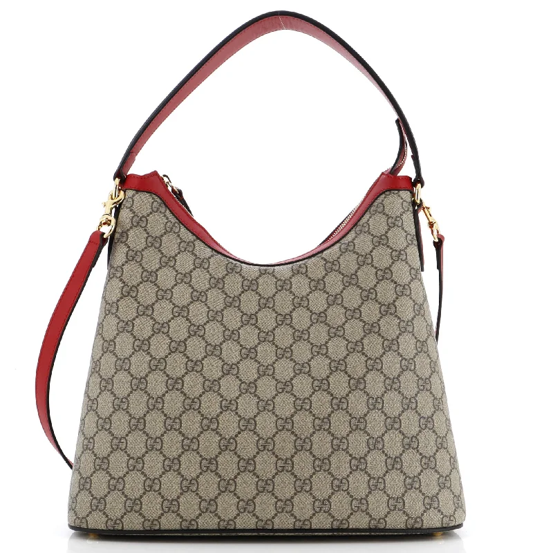 Women Gucci Sylvie bags with a monogram - embossed leatherLinea A Hobo GG Coated Canvas