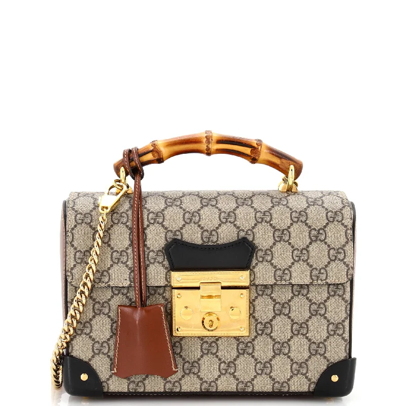 Women Gucci Sylvie bags with a crystal - embellished web stripePadlock Bamboo Shoulder Bag GG Coated Canvas Small