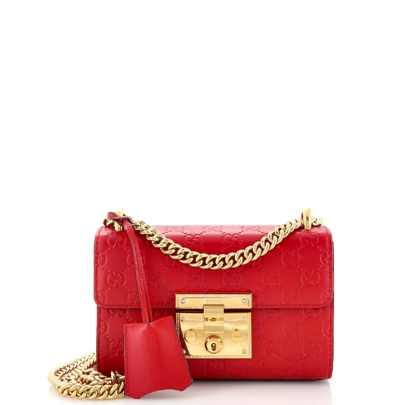 Women Gucci Sylvie bags with a monogram - embossed leatherPadlock Shoulder Bag Guccissima Leather Small