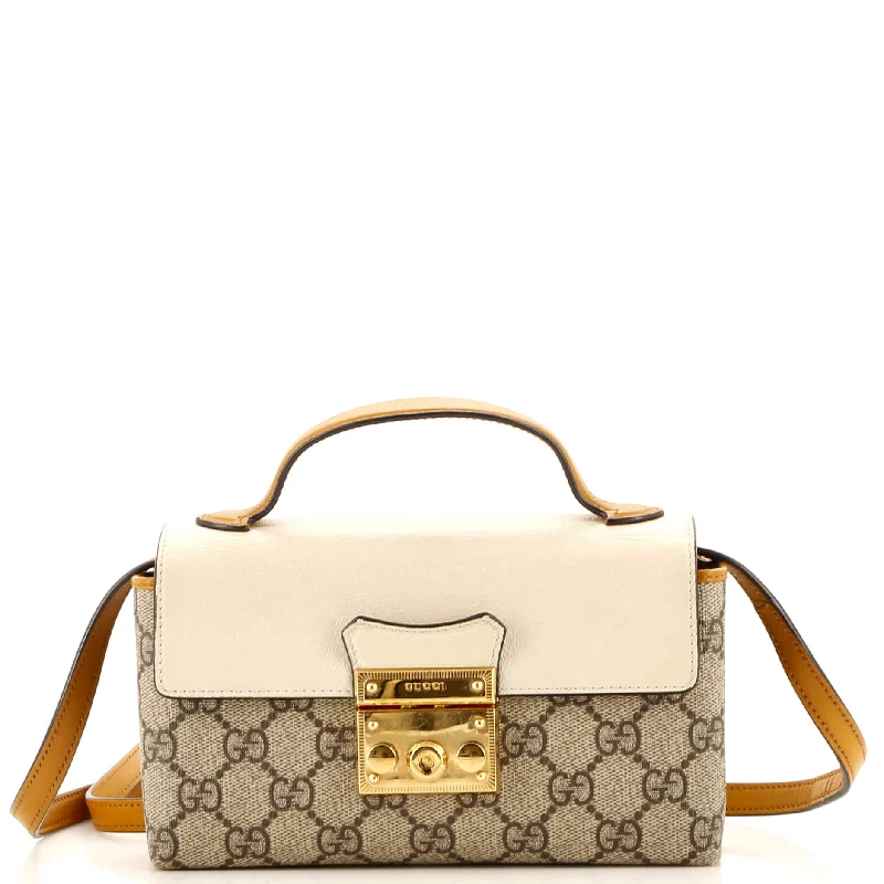 Gucci Marmont bags for women with a contrast - colored interiorPadlock Top Handle Bag GG Coated Canvas and Leather Mini